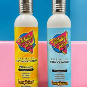 Two bottles of lotion sitting on a pink surface.